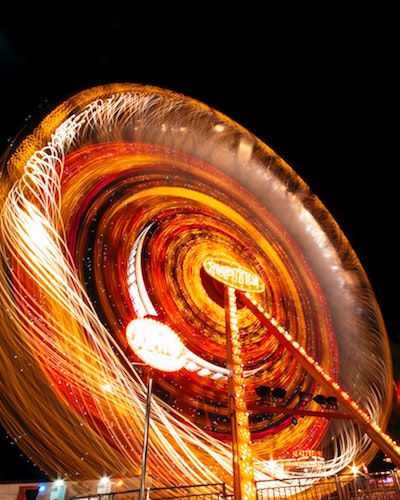 Spinning Lighted Ferris Wheel – analogy of chakra energy vortex (image by Engin Akyurt, Pexels.com) © Wicca-Spirituality.com